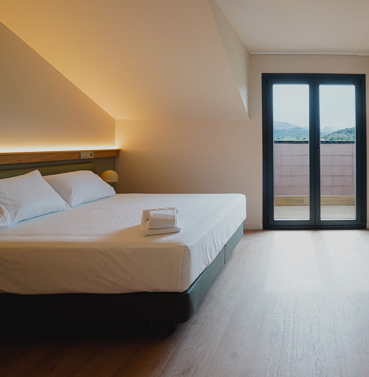 Habitación triple Vista general de la habitación triple del Hotel Los Pasiegos