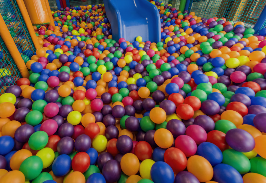 Children's playground with slide and ball pool